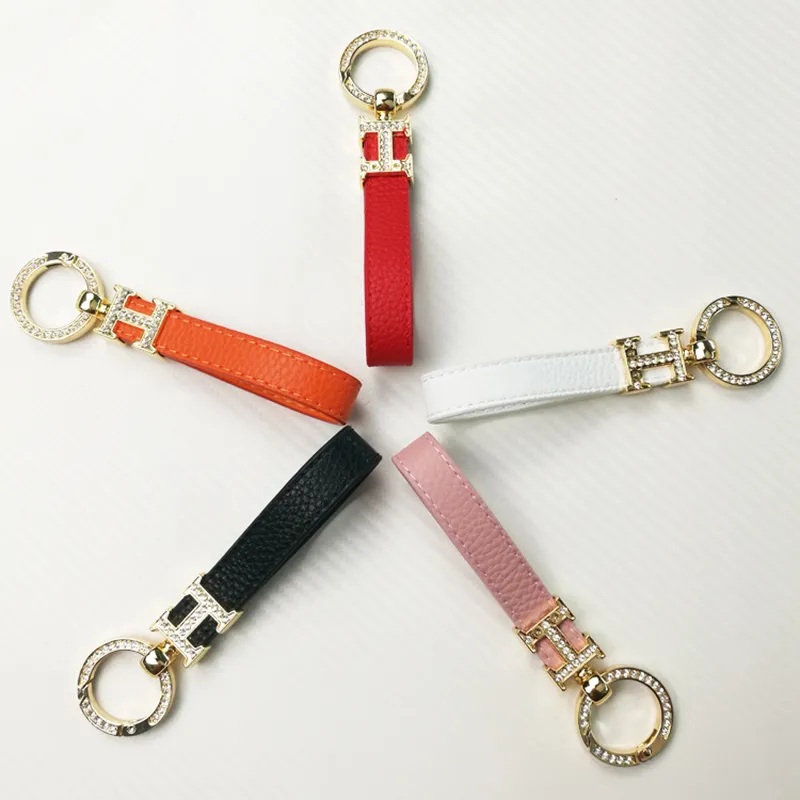พวงกุญแจสายหนังจี้H (KEYCHAIN-00896)